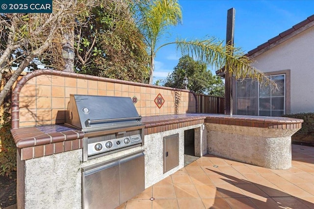 view of patio featuring grilling area and area for grilling