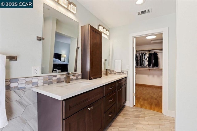 bathroom featuring hardwood / wood-style floors and vanity