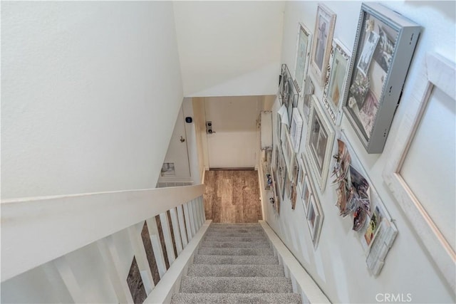 4900 E Chapman Ave Unit 24, Orange, CA 92869 - stairway featuring a towering ceiling