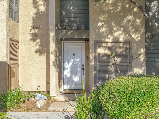 4900 E Chapman Ave Unit 24, Orange, CA 92869 - property entrance featuring stucco siding