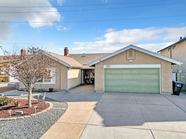 ranch-style house featuring a garage