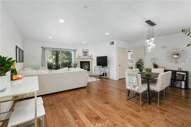 dining room with hardwood / wood-style flooring