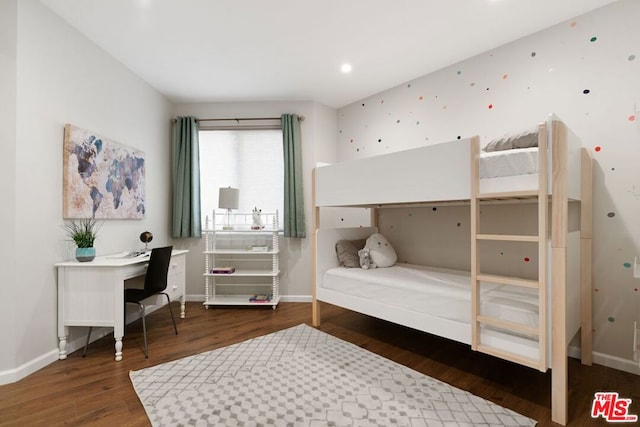 bedroom featuring dark wood-type flooring