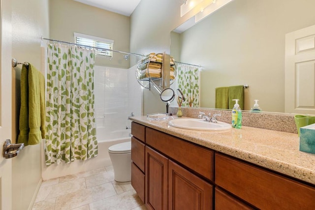 full bathroom featuring tile patterned flooring, shower / tub combo with curtain, vanity, and toilet