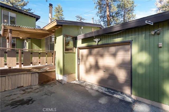 exterior space featuring a garage