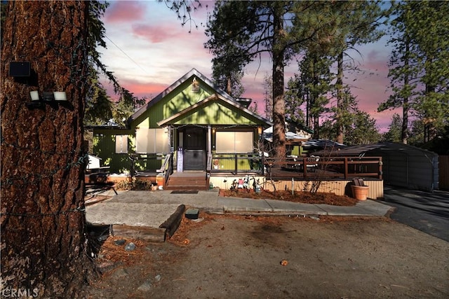 view of front of home featuring a carport