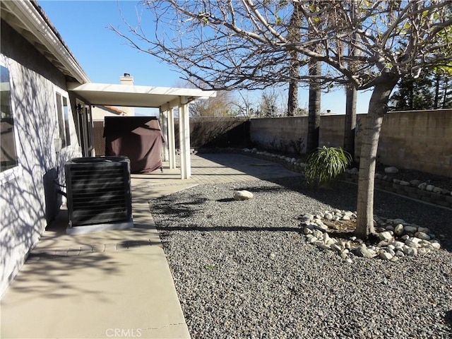 view of yard with a patio and cooling unit