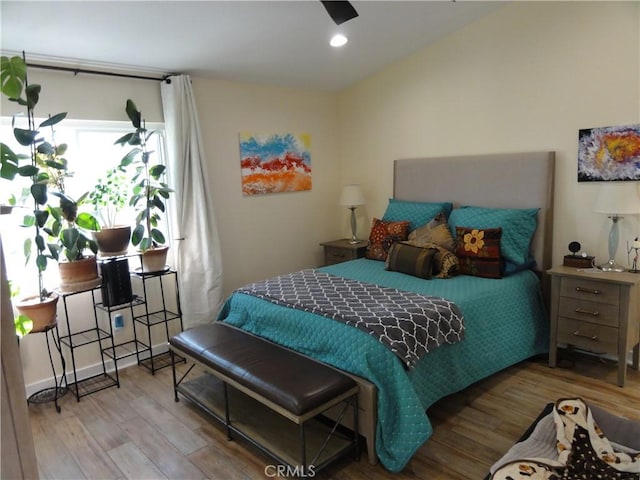 bedroom with light hardwood / wood-style flooring