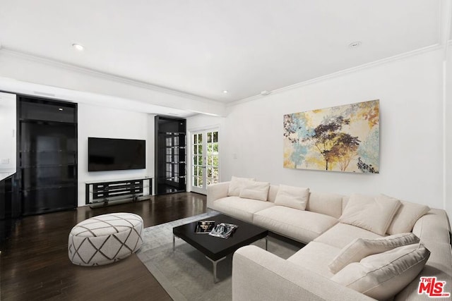 living room featuring ornamental molding and wood-type flooring