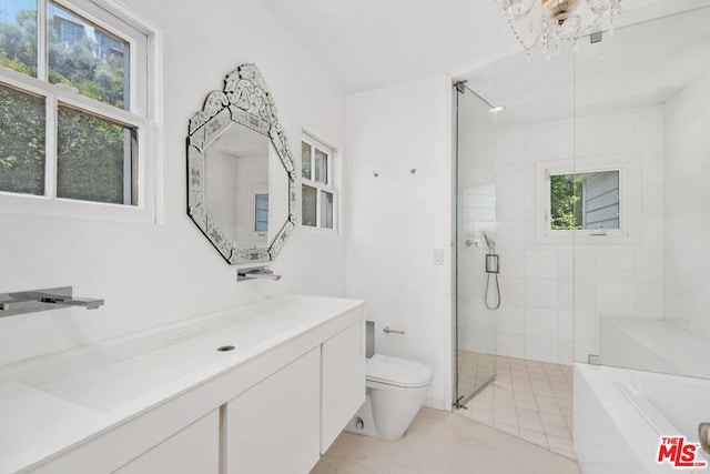 full bathroom featuring vanity, tile patterned flooring, toilet, and plus walk in shower