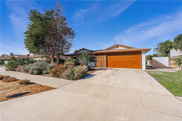 ranch-style home with a garage