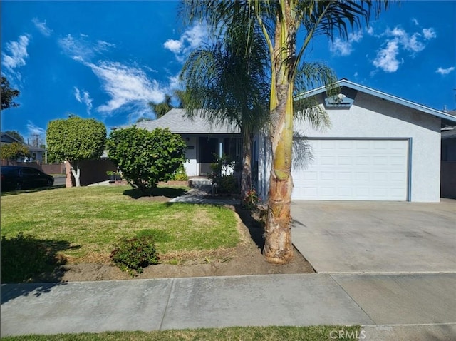 view of front facade featuring a front yard and a garage