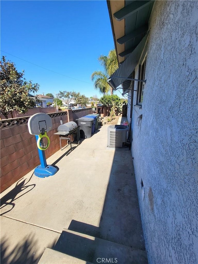 view of patio / terrace with central air condition unit