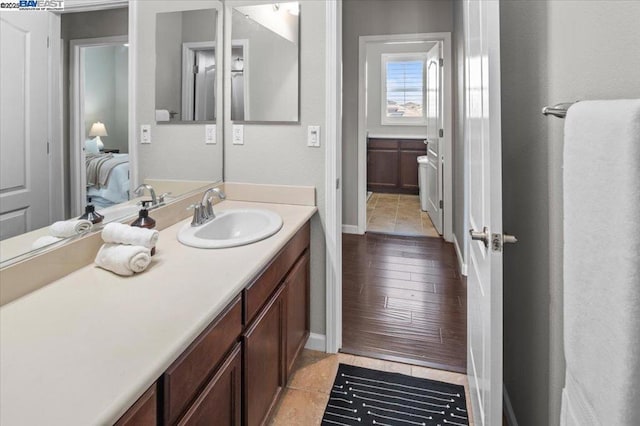 bathroom featuring vanity and tile patterned floors