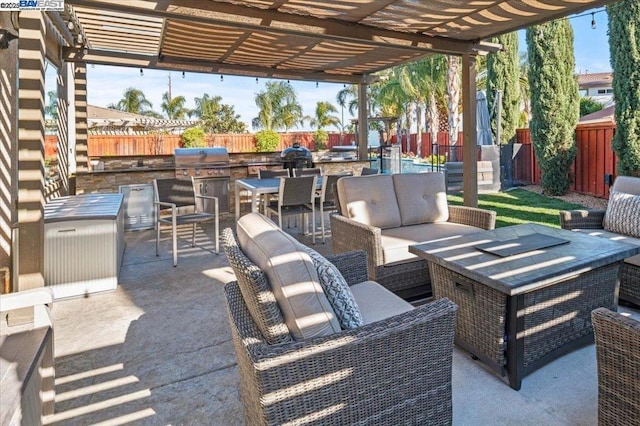 view of patio / terrace with an outdoor hangout area, a pergola, and exterior kitchen