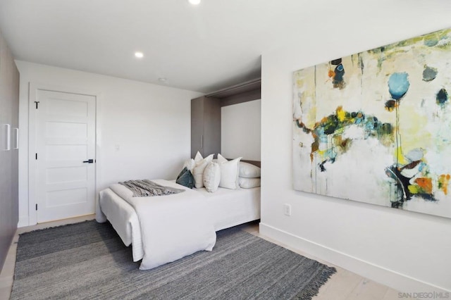 bedroom featuring dark hardwood / wood-style floors