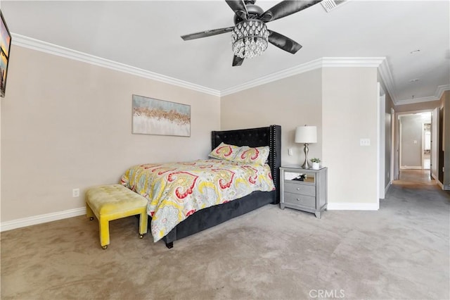 carpeted bedroom featuring ceiling fan, ornamental molding, visible vents, and baseboards