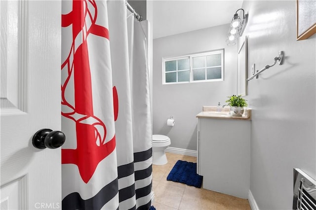 full bathroom with baseboards, a shower with shower curtain, toilet, tile patterned flooring, and vanity