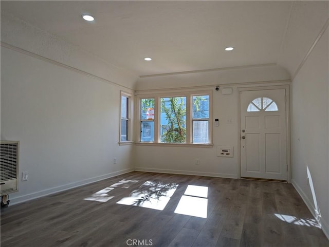 entryway with dark wood-type flooring, recessed lighting, heating unit, and baseboards