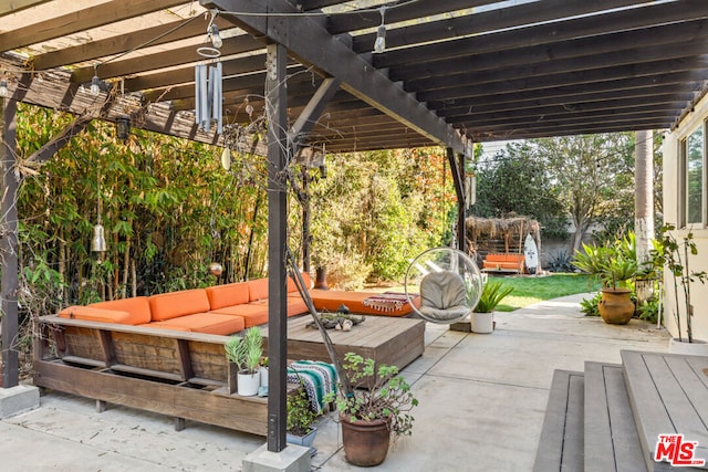 view of patio / terrace with a pergola and an outdoor living space