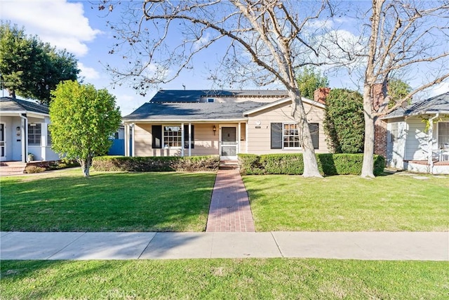 ranch-style house with a front lawn