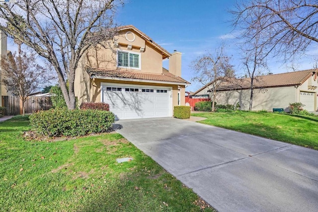 view of front facade featuring a garage and a front lawn