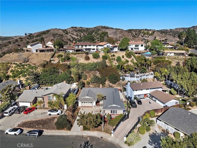 bird's eye view with a mountain view and a residential view