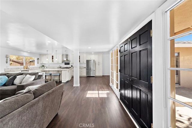 living room with dark wood-type flooring