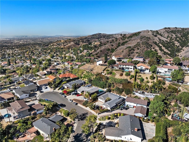 birds eye view of property featuring a residential view and a mountain view