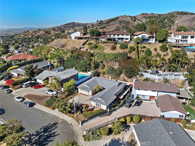 aerial view featuring a mountain view and a residential view