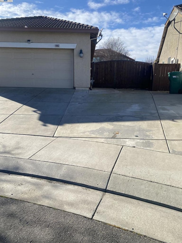 view of home's exterior with a garage