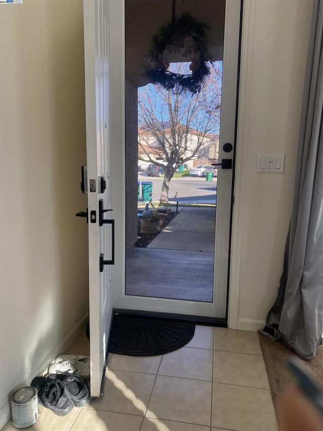 view of tiled foyer entrance