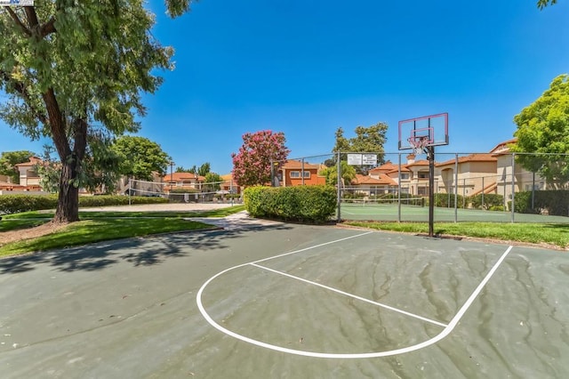 view of basketball court featuring volleyball court