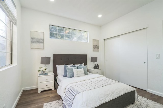 bedroom featuring dark wood-type flooring