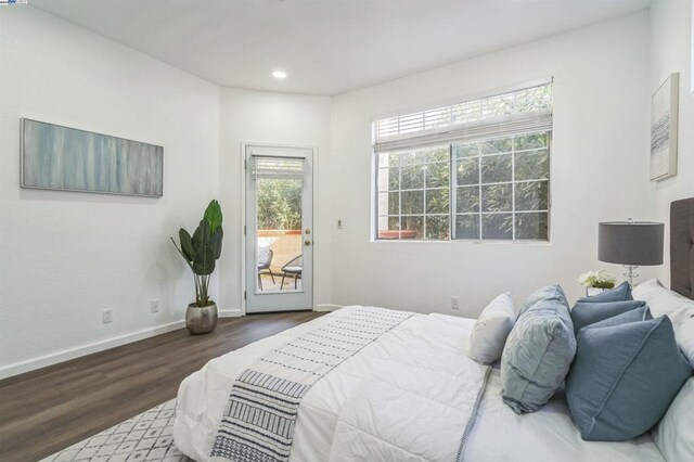 bedroom featuring dark wood-type flooring