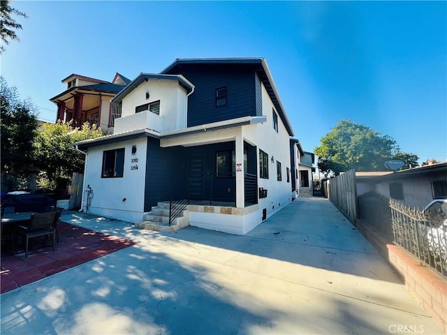 view of front of home with a patio area