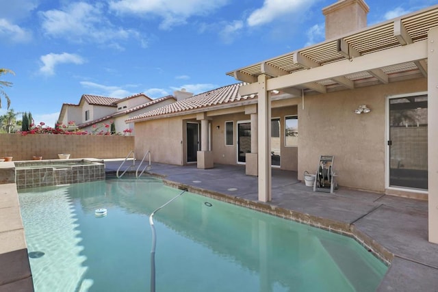 view of pool with an in ground hot tub, a patio, and a pergola