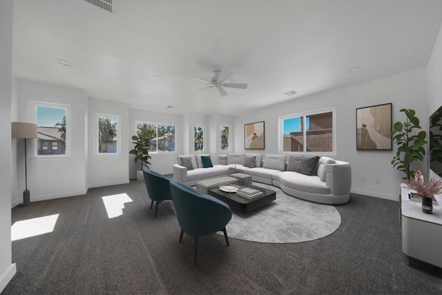 carpeted living room featuring ceiling fan