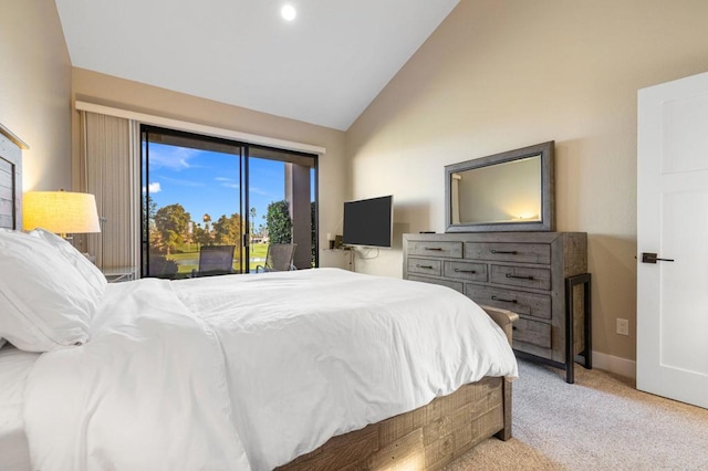 carpeted bedroom featuring vaulted ceiling