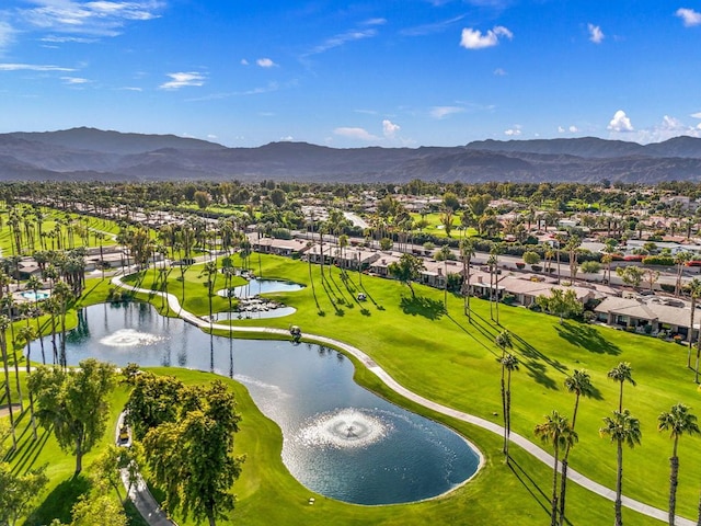 birds eye view of property featuring a water and mountain view