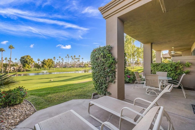 view of patio / terrace with a water view