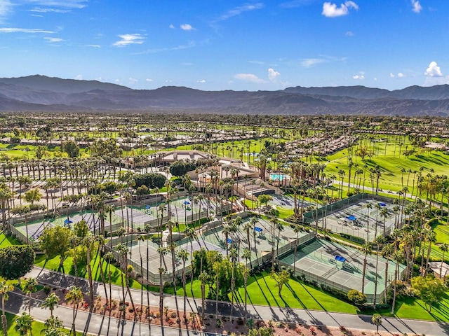 birds eye view of property with a mountain view