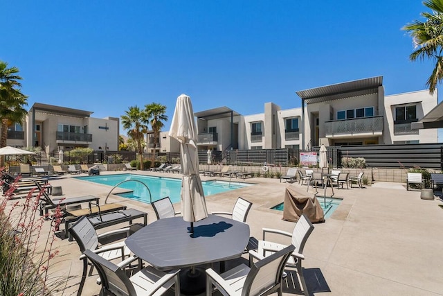 view of swimming pool featuring a patio