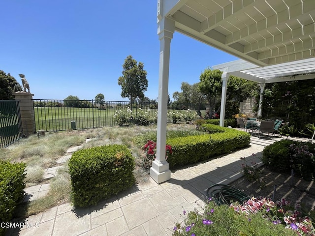 view of yard with a patio and a pergola