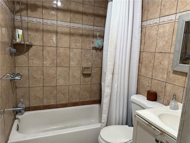 full bathroom featuring vanity, shower / tub combo, and toilet