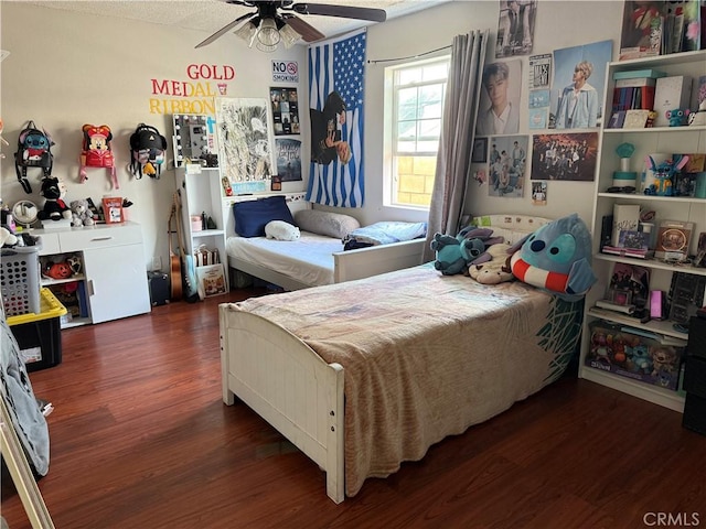 bedroom featuring dark wood-type flooring