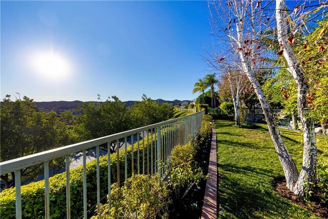 balcony featuring a mountain view