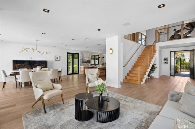 living room with a wealth of natural light and hardwood / wood-style floors