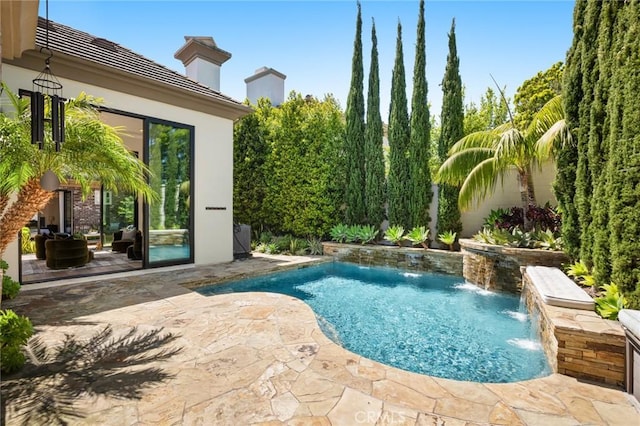 view of swimming pool featuring a patio area and pool water feature