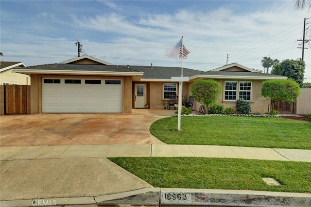 ranch-style home featuring a garage and a front lawn